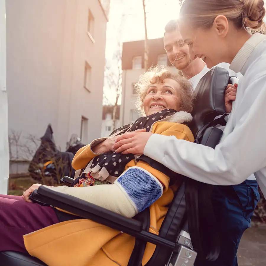 Dispatch Medical Transport, Inc. - elderly woman post surgery is wheeled onto medical transport vehicle to go home from the hospital - Springfield, IL